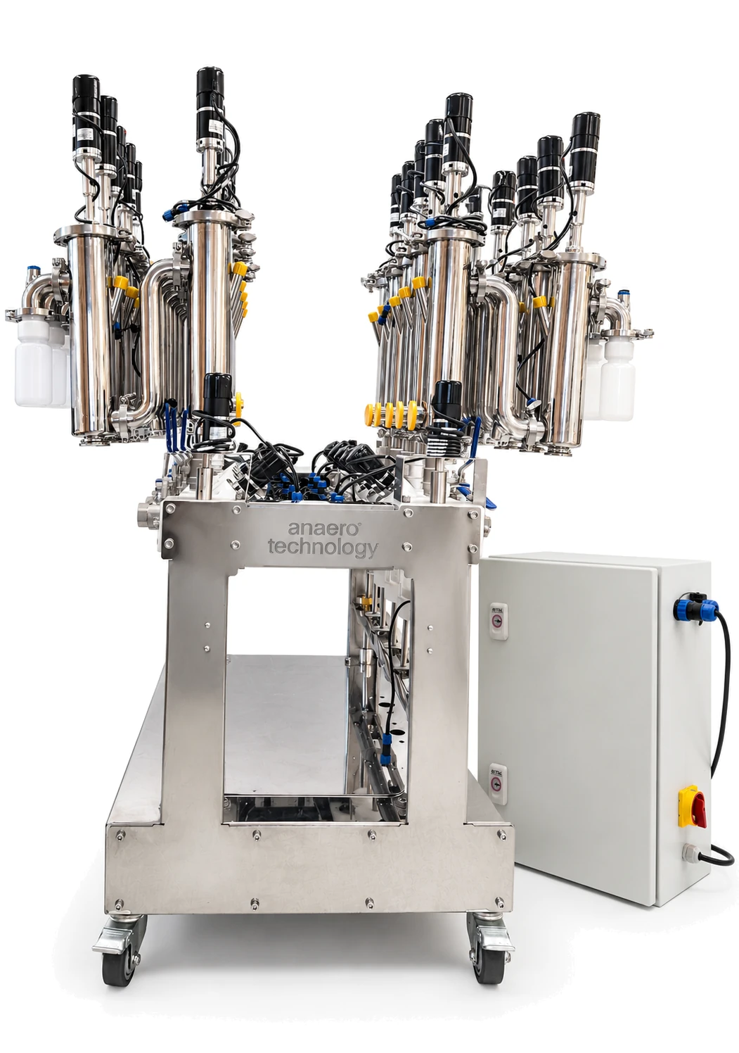 The Hungry Caterpillar two-stage reactor array on its stainless frame, beside its PLC control cabinet